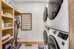 Lower level laundry room with twin washers/dryers